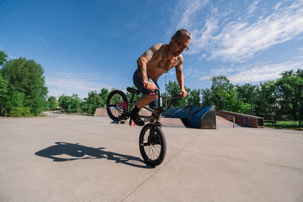 Adult on bmx sale